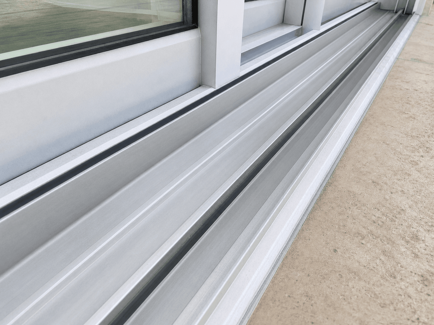Illustration after track cleaning showing a clean detailed sliding door track at a South Florida property